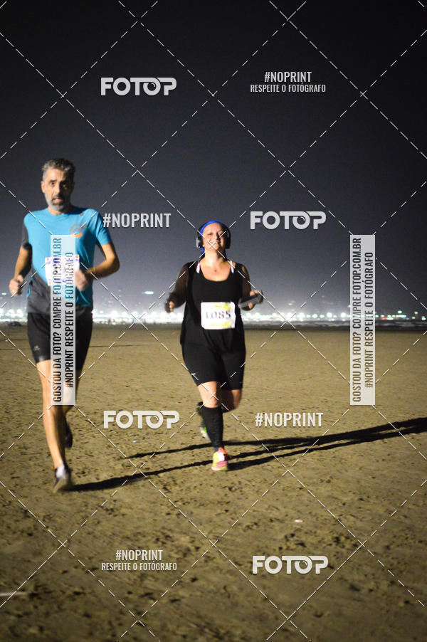 Buy your photos of the eventJovem Pan Night Run Santos on Fotop
