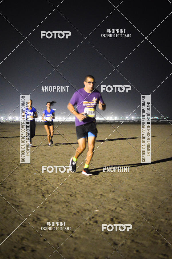 Buy your photos of the eventJovem Pan Night Run Santos on Fotop