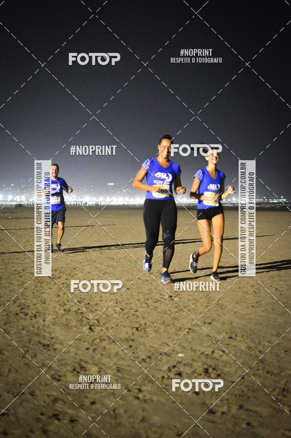 Buy your photos of the eventJovem Pan Night Run Santos on Fotop