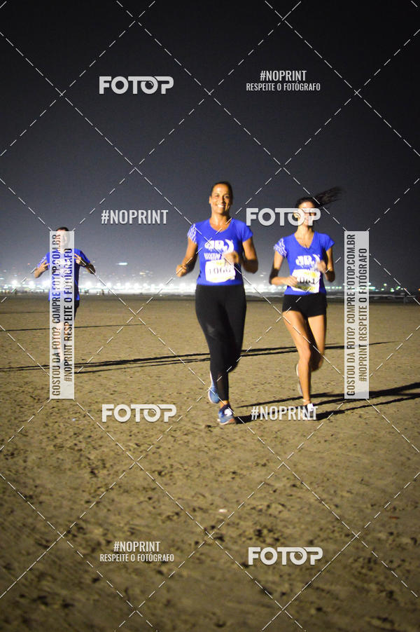 Buy your photos of the eventJovem Pan Night Run Santos on Fotop