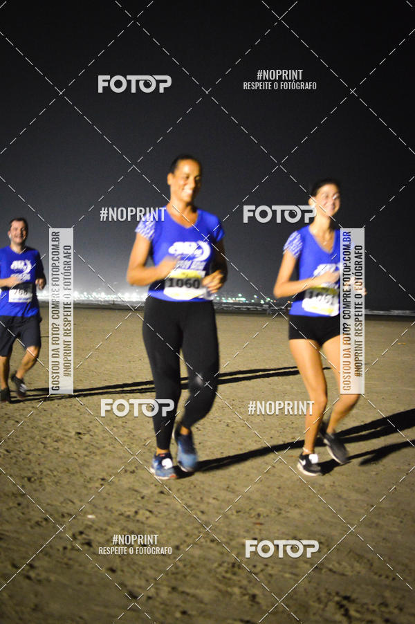 Buy your photos of the eventJovem Pan Night Run Santos on Fotop