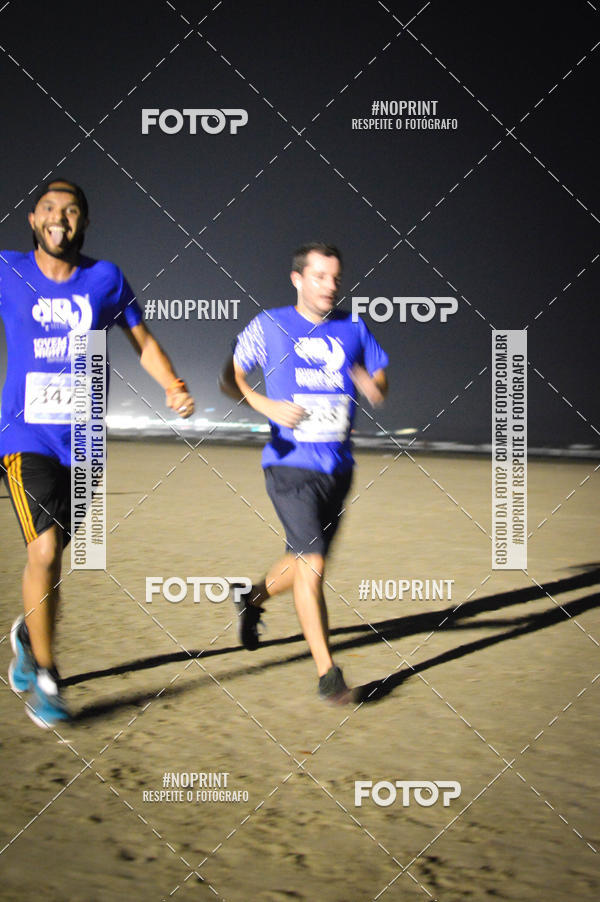 Buy your photos of the eventJovem Pan Night Run Santos on Fotop
