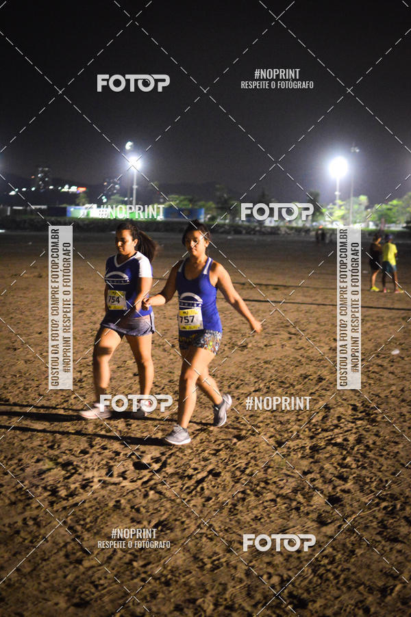 Buy your photos of the eventJovem Pan Night Run Santos on Fotop