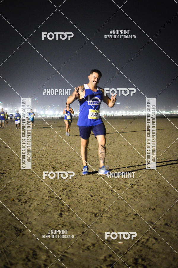 Buy your photos of the eventJovem Pan Night Run Santos on Fotop