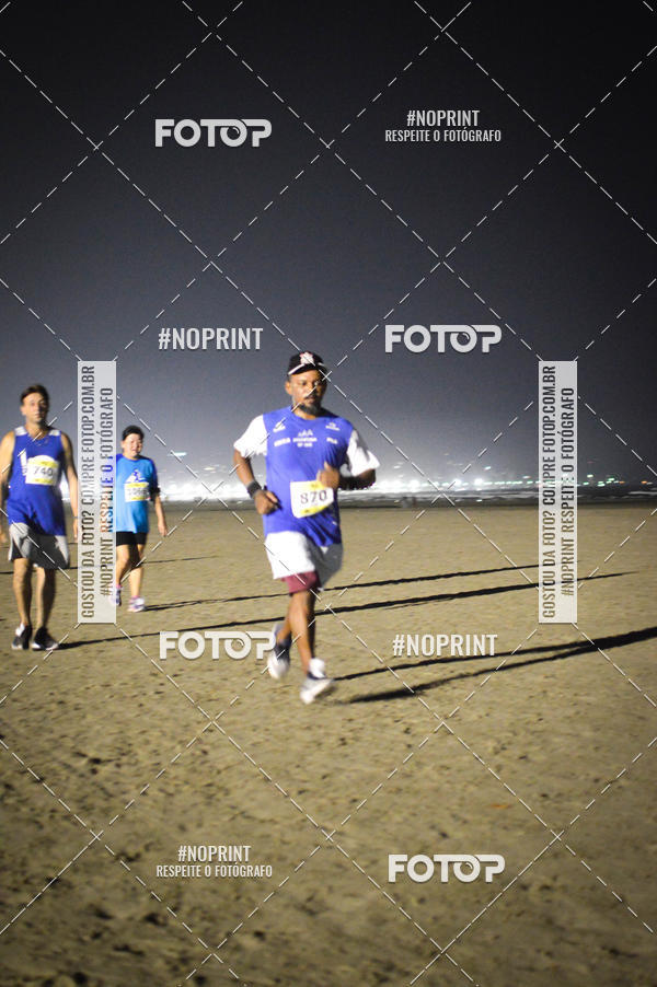 Buy your photos of the eventJovem Pan Night Run Santos on Fotop