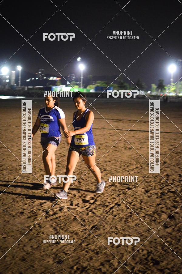 Buy your photos of the eventJovem Pan Night Run Santos on Fotop
