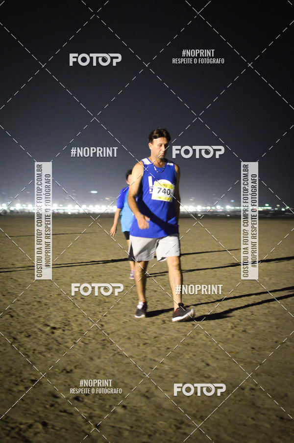 Buy your photos of the eventJovem Pan Night Run Santos on Fotop