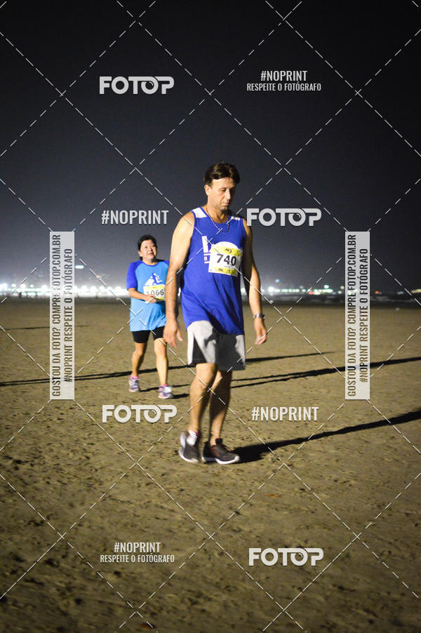 Buy your photos of the eventJovem Pan Night Run Santos on Fotop