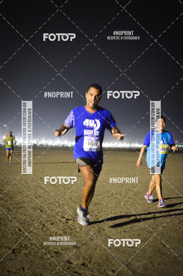 Buy your photos of the eventJovem Pan Night Run Santos on Fotop