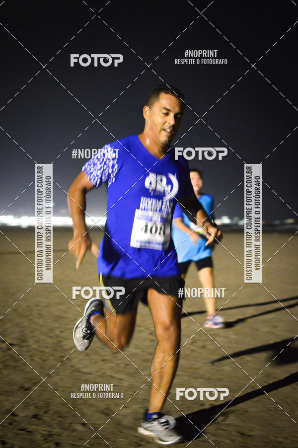 Buy your photos of the eventJovem Pan Night Run Santos on Fotop