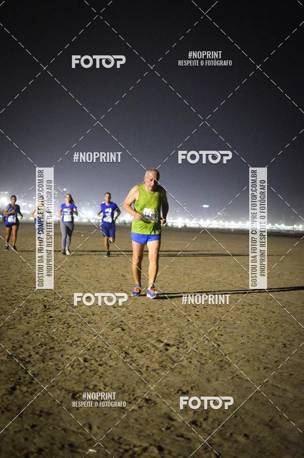 Buy your photos of the eventJovem Pan Night Run Santos on Fotop