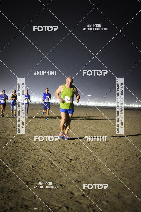 Buy your photos of the eventJovem Pan Night Run Santos on Fotop