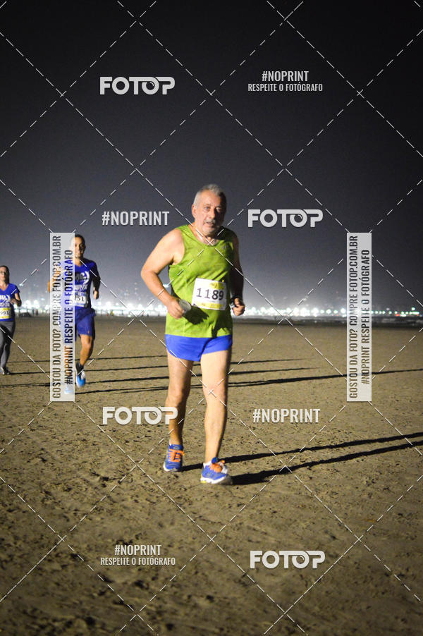 Buy your photos of the eventJovem Pan Night Run Santos on Fotop