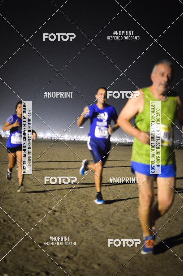 Buy your photos of the eventJovem Pan Night Run Santos on Fotop