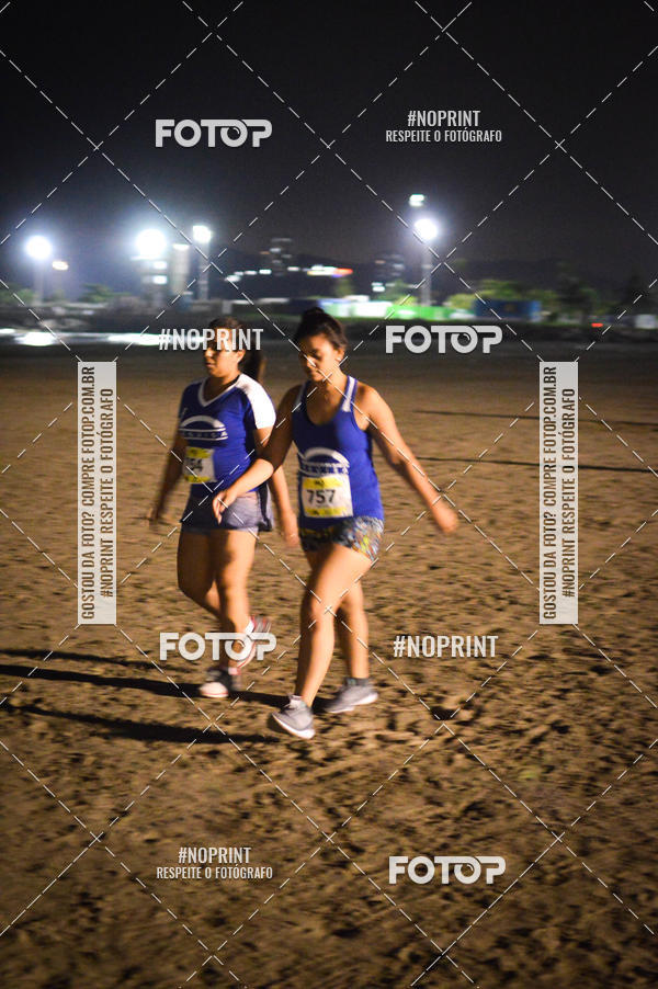Buy your photos of the eventJovem Pan Night Run Santos on Fotop