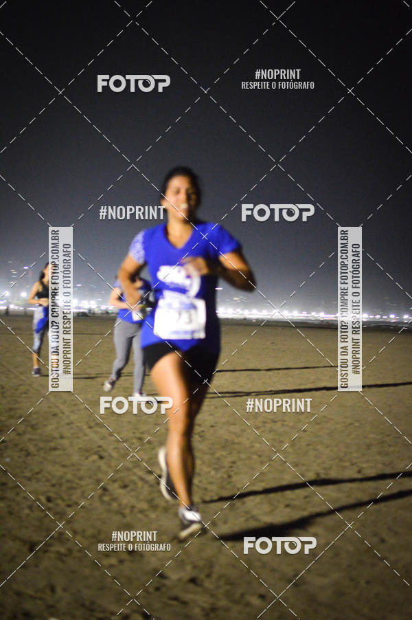 Buy your photos of the eventJovem Pan Night Run Santos on Fotop