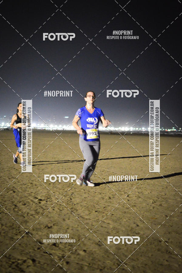 Buy your photos of the eventJovem Pan Night Run Santos on Fotop