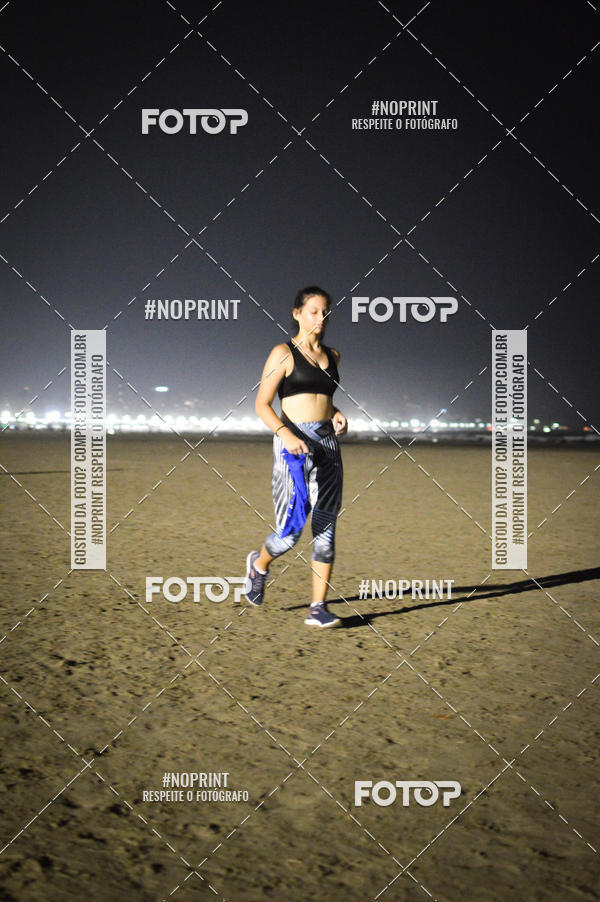 Buy your photos of the eventJovem Pan Night Run Santos on Fotop