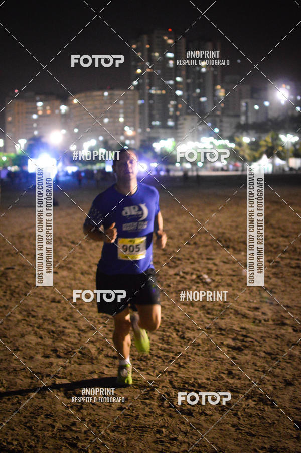 Buy your photos of the eventJovem Pan Night Run Santos on Fotop