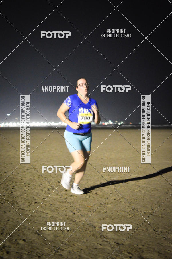 Buy your photos of the eventJovem Pan Night Run Santos on Fotop