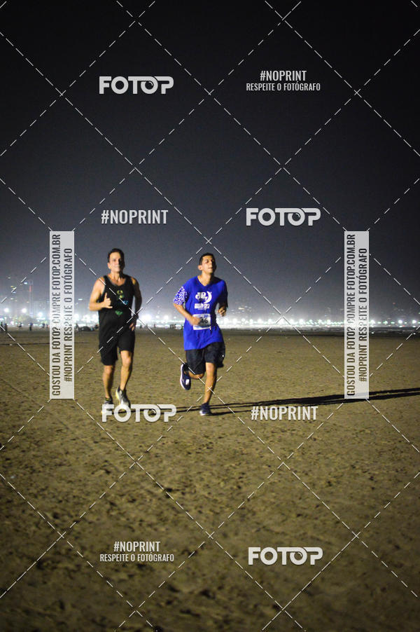 Buy your photos of the eventJovem Pan Night Run Santos on Fotop