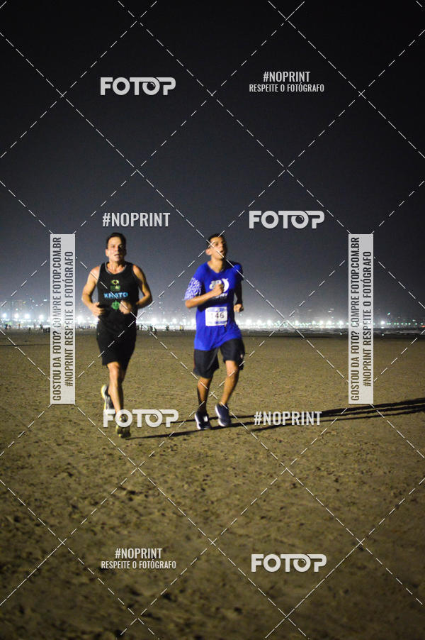 Buy your photos of the eventJovem Pan Night Run Santos on Fotop
