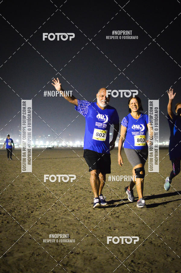 Buy your photos of the eventJovem Pan Night Run Santos on Fotop