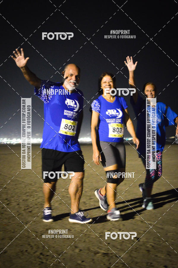 Buy your photos of the eventJovem Pan Night Run Santos on Fotop