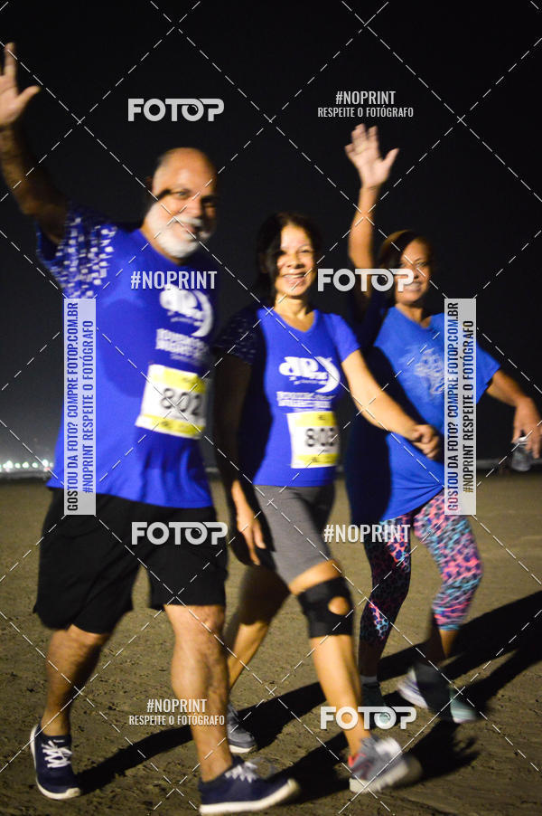 Buy your photos of the eventJovem Pan Night Run Santos on Fotop