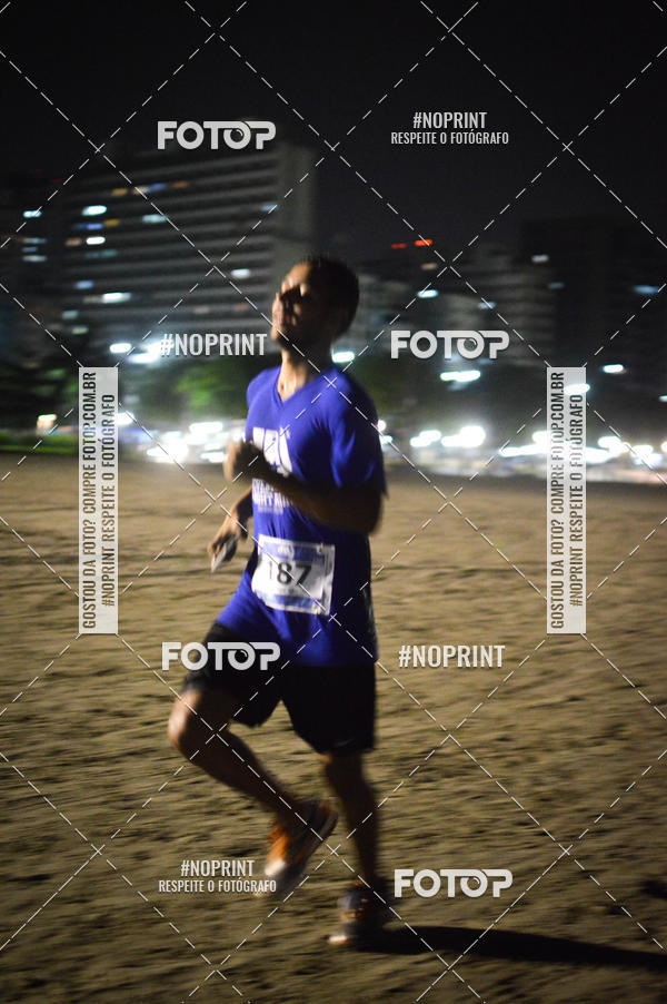 Buy your photos of the eventJovem Pan Night Run Santos on Fotop