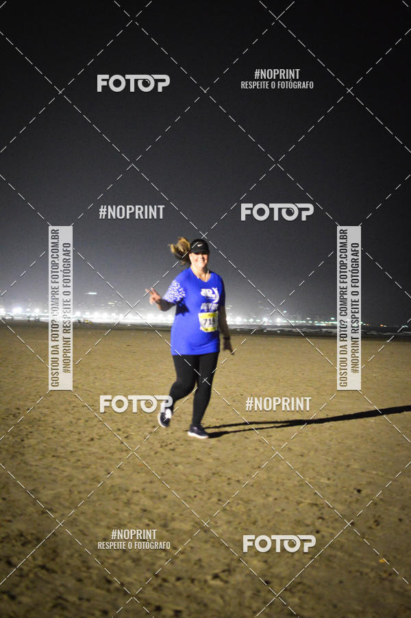 Buy your photos of the eventJovem Pan Night Run Santos on Fotop