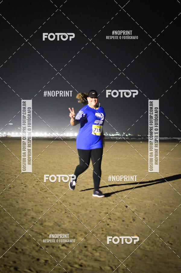 Buy your photos of the eventJovem Pan Night Run Santos on Fotop