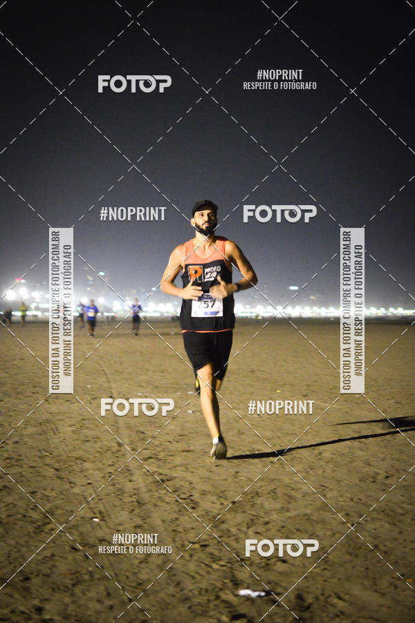 Buy your photos of the eventJovem Pan Night Run Santos on Fotop