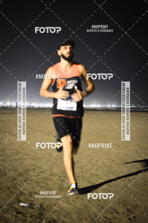 Buy your photos of the eventJovem Pan Night Run Santos on Fotop