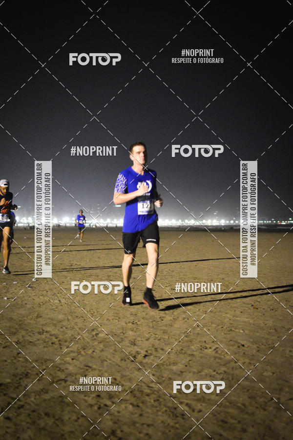 Buy your photos of the eventJovem Pan Night Run Santos on Fotop