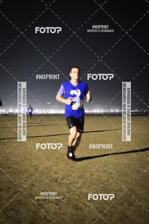 Buy your photos of the eventJovem Pan Night Run Santos on Fotop
