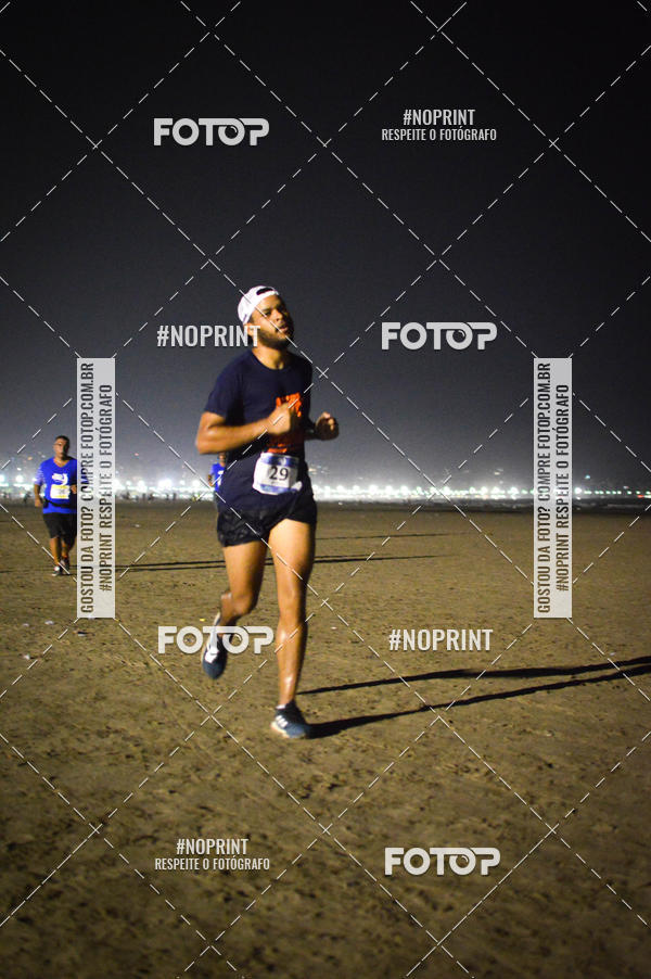 Buy your photos of the eventJovem Pan Night Run Santos on Fotop