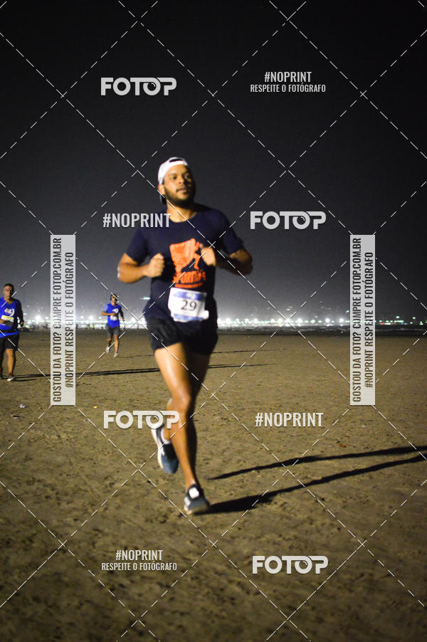 Buy your photos of the eventJovem Pan Night Run Santos on Fotop