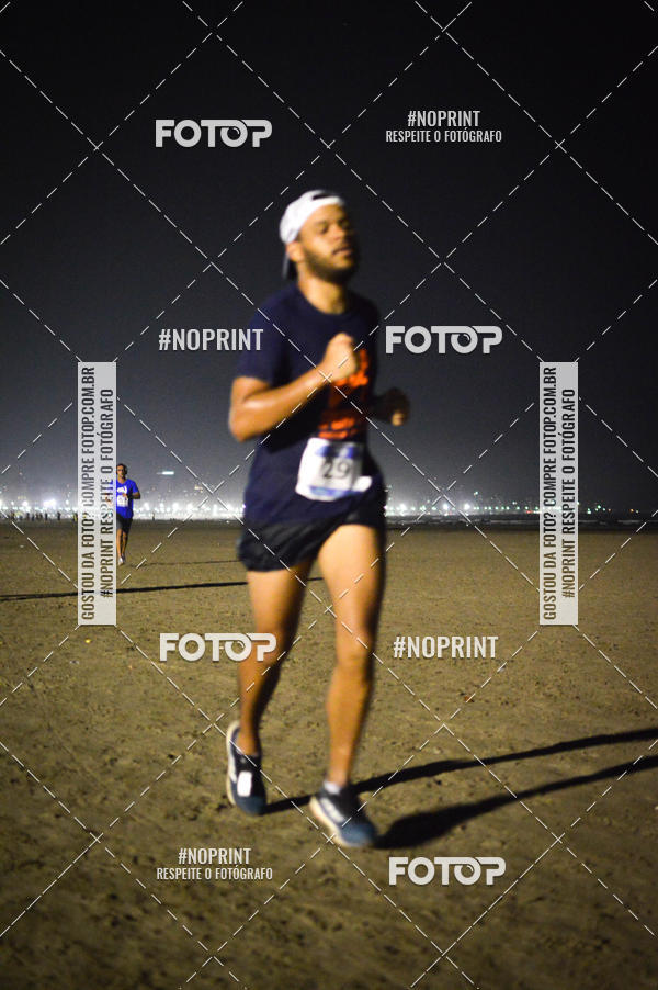 Buy your photos of the eventJovem Pan Night Run Santos on Fotop
