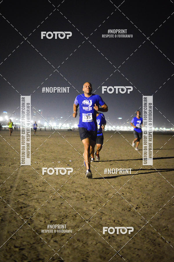 Buy your photos of the eventJovem Pan Night Run Santos on Fotop