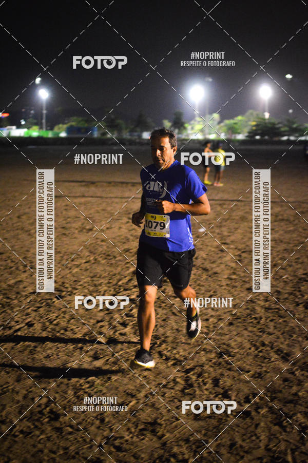 Buy your photos of the eventJovem Pan Night Run Santos on Fotop