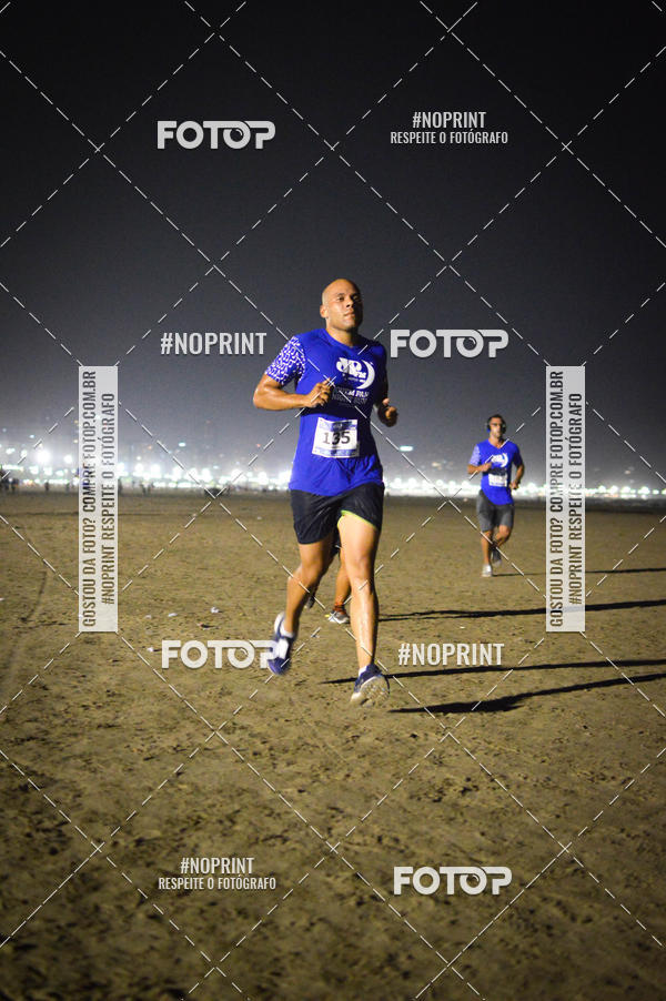 Buy your photos of the eventJovem Pan Night Run Santos on Fotop