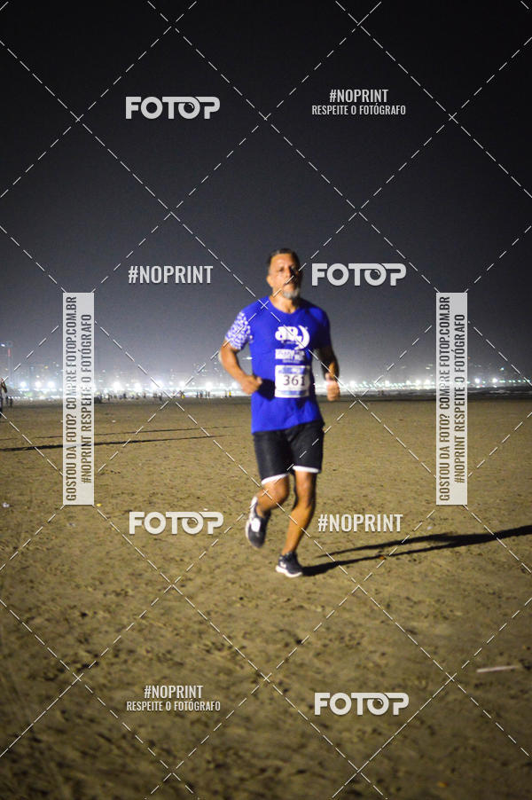 Buy your photos of the eventJovem Pan Night Run Santos on Fotop