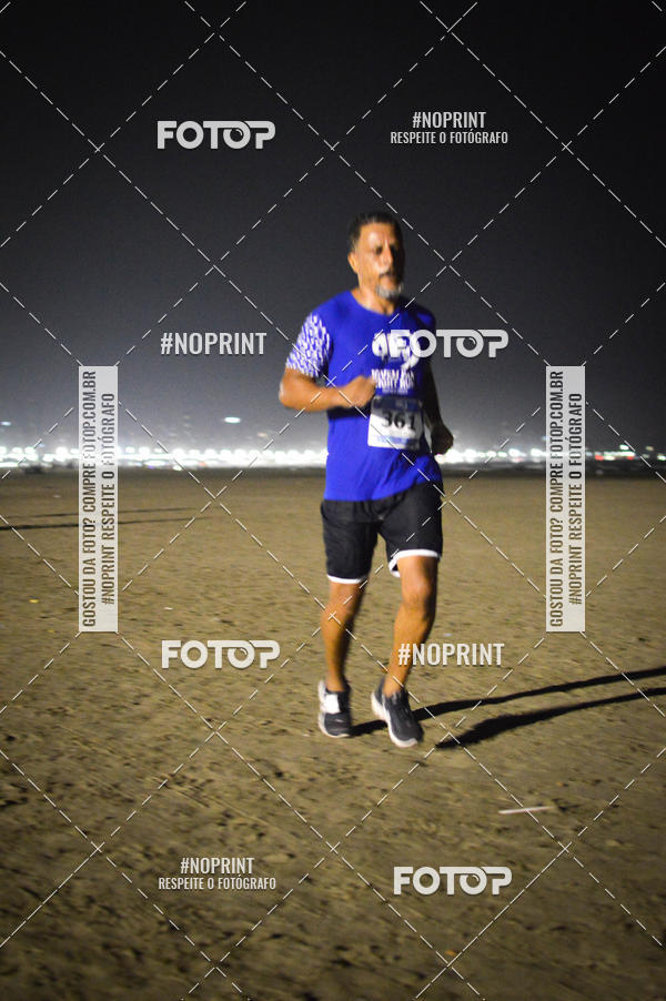 Buy your photos of the eventJovem Pan Night Run Santos on Fotop