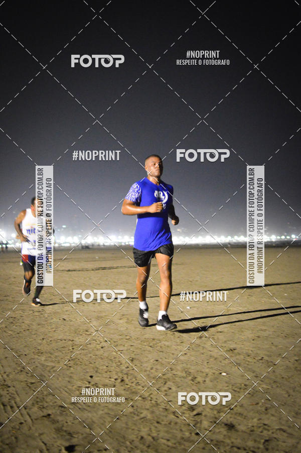 Buy your photos of the eventJovem Pan Night Run Santos on Fotop