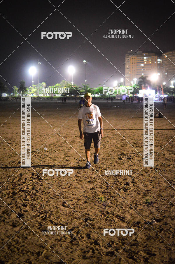 Buy your photos of the eventJovem Pan Night Run Santos on Fotop