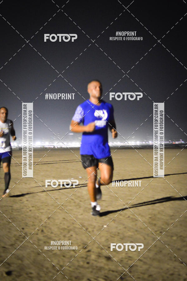 Buy your photos of the eventJovem Pan Night Run Santos on Fotop