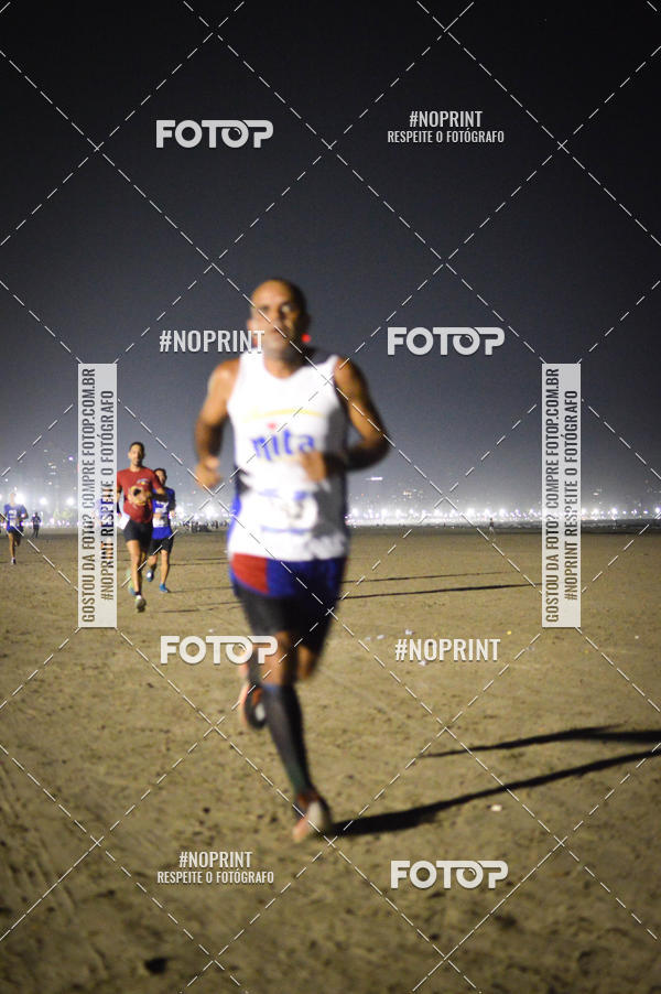 Buy your photos of the eventJovem Pan Night Run Santos on Fotop