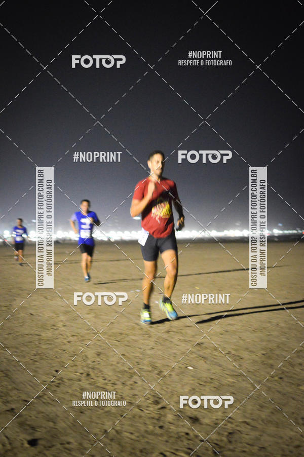 Buy your photos of the eventJovem Pan Night Run Santos on Fotop