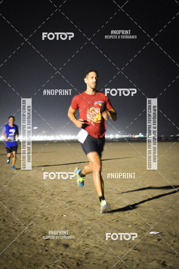 Buy your photos of the eventJovem Pan Night Run Santos on Fotop